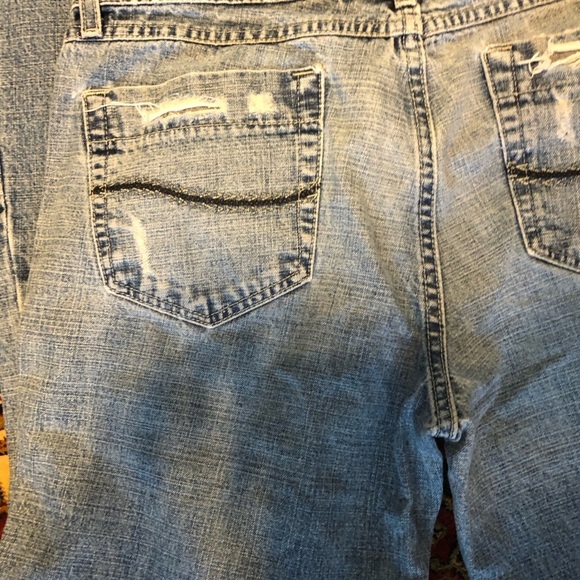 Blue flare Jeans with Distressed Details 13 - Picture 8 of 13